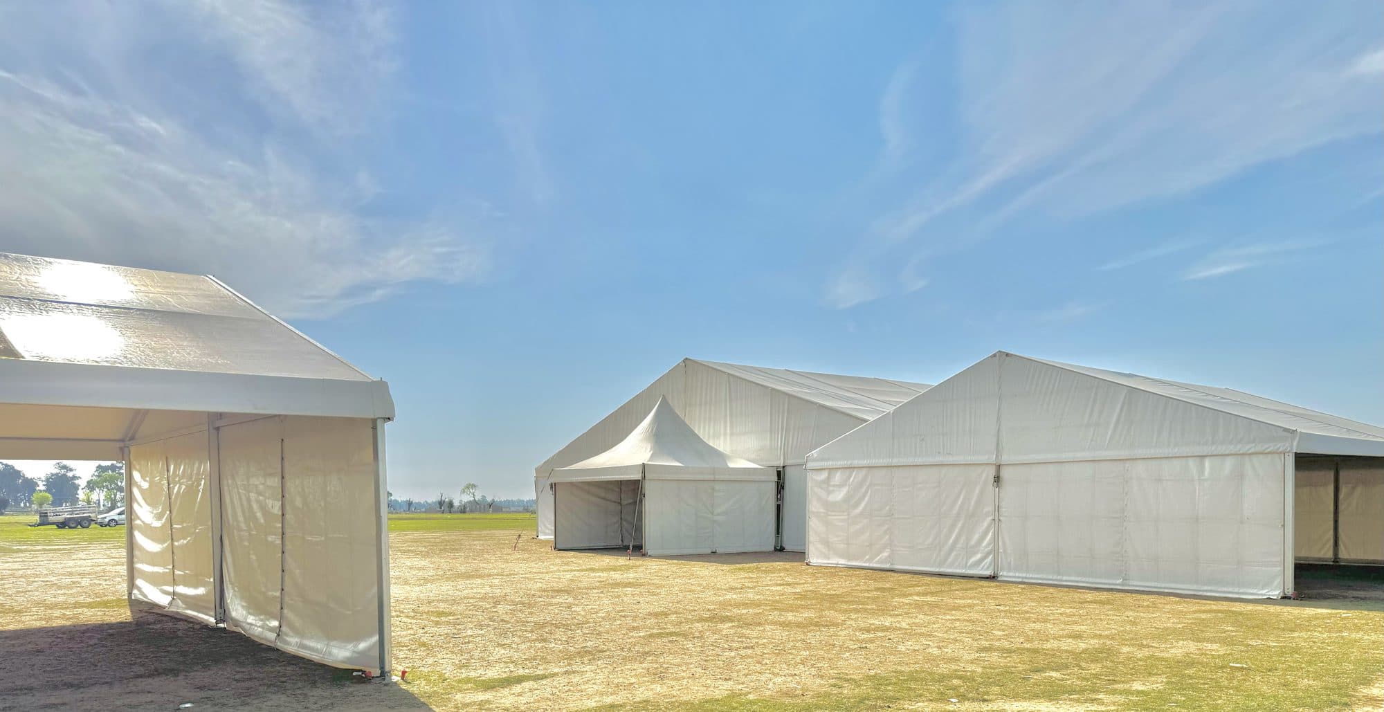 Large frame marquee on open ground