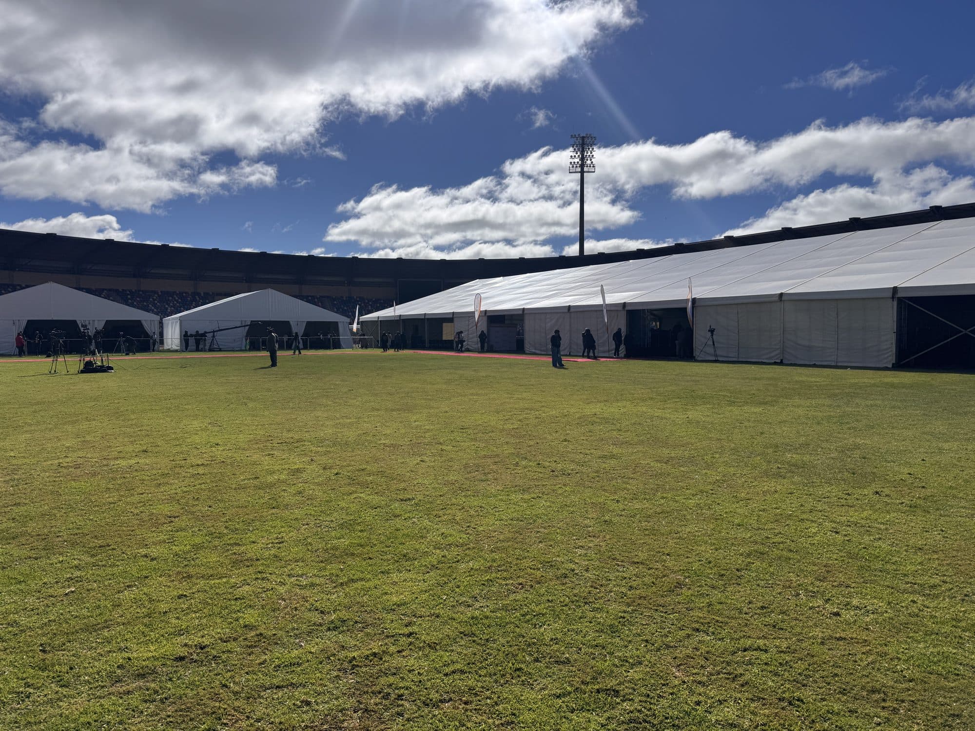 Rows of marquees at a stadium for Freedom Day 2026
