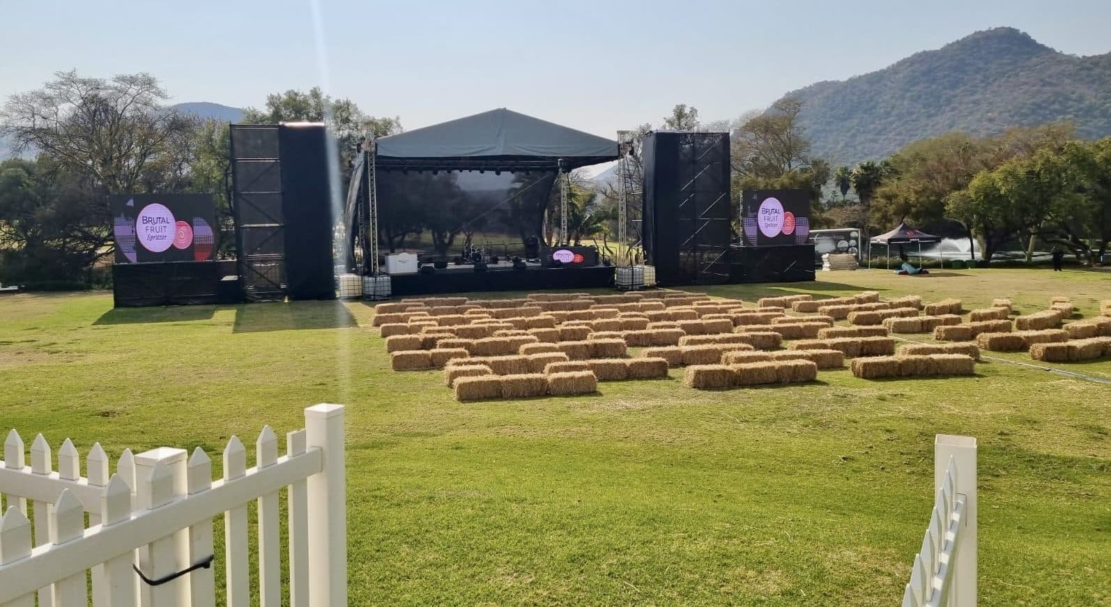Outdoor concert stage with hay bale seating